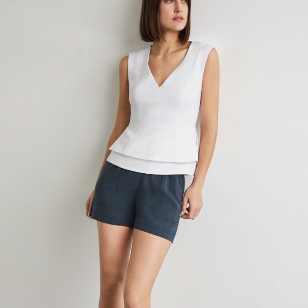 NWOT BCBG white peplum top